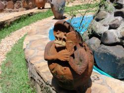 Gorilla with cell phone at Kigali Genocide Memorial  is monument to Rwanda's progress.